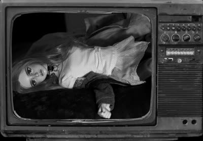 girl on old TV screen